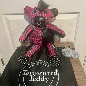 Dolls Kill Punk Tormented Teddy Backpack.